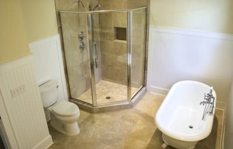 Travertine shower tiles and floors in bathroom